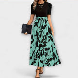 Luna - Vasaras kleita ar ziedu motīviem un apaļu izgriezumu