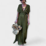 "Grieķu stila maxi kimono kleita" can be rewritten as "Maxi kimono kleita ar Grieķu iedvesmu".
