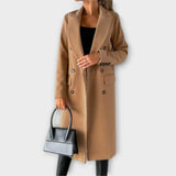 "Judith - Elegants Vilnas Mētelis" can be rewritten as "Judith - St stylish Wool Coat".