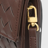 Melanie Clutch ar Zelta Mezglu Akcentiem