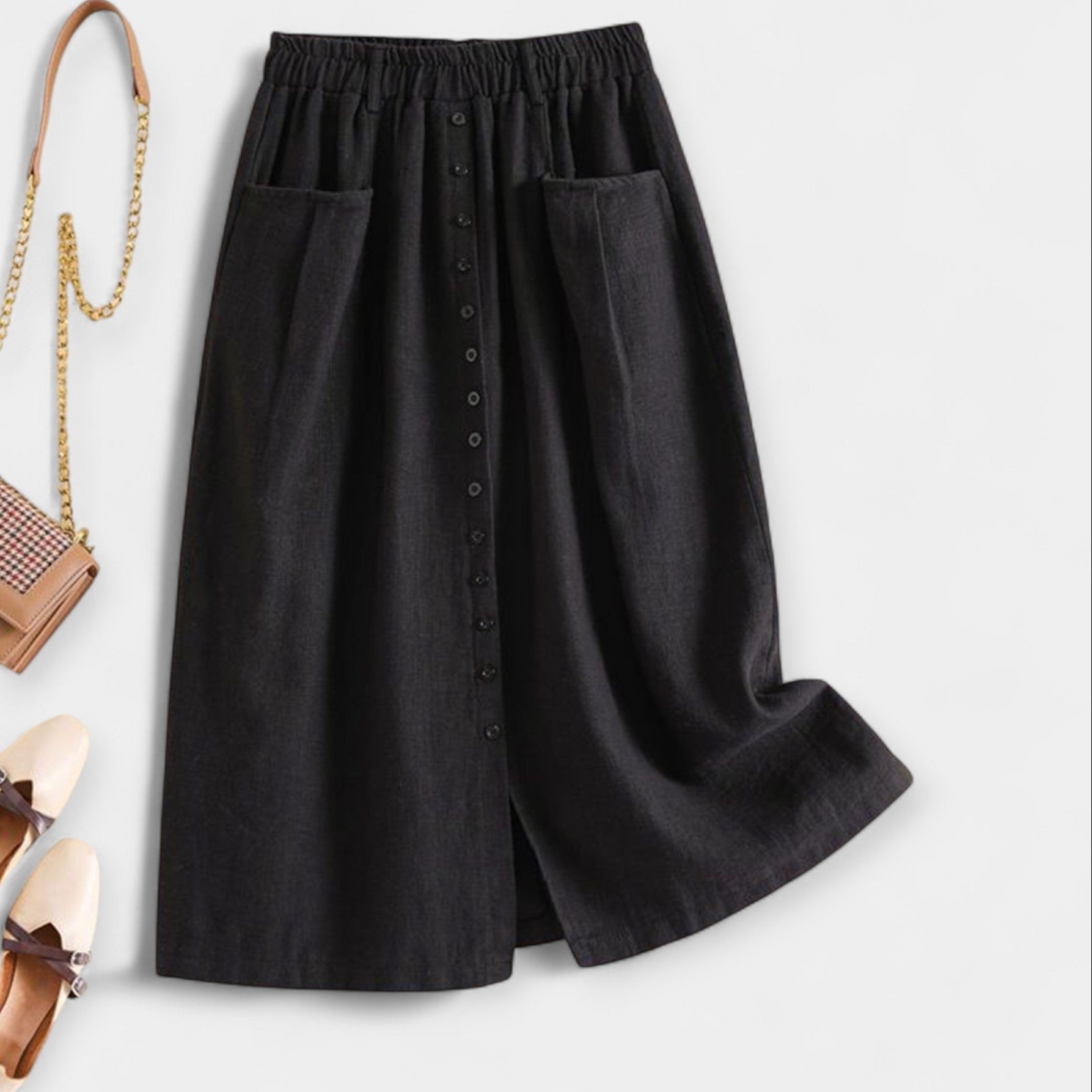 Emma - Vintage Stila Svārki" can be rewritten as "Emma - Retro Style Skirt.